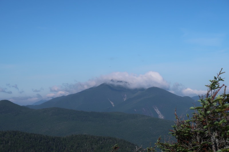 A cloud apron forms along the summit ridge of Algonquin, as seen from the Great Range.
