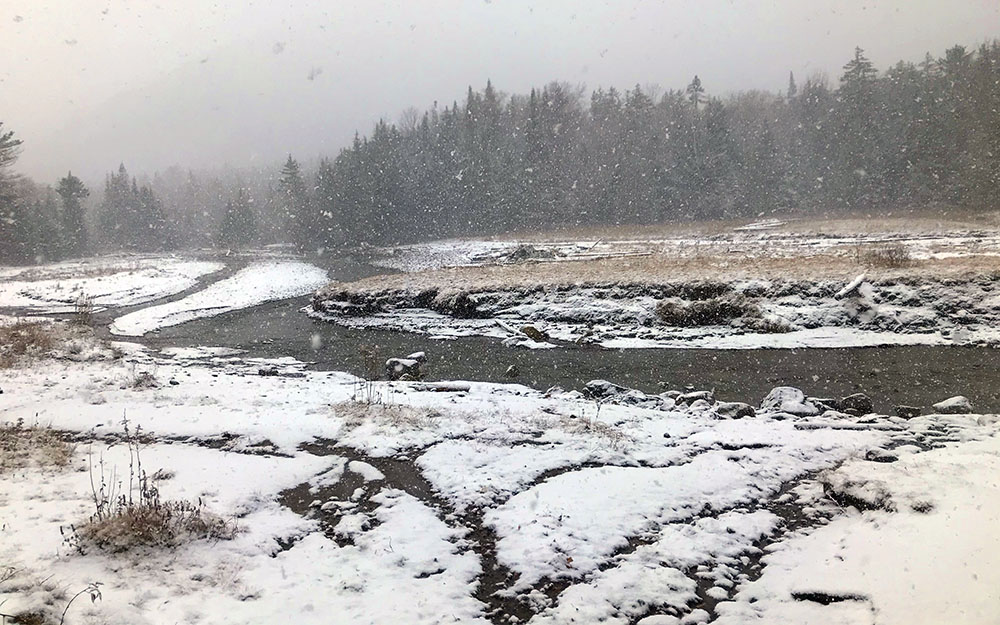 The snowfall begins to coat the flood plains near Marcy Dam.