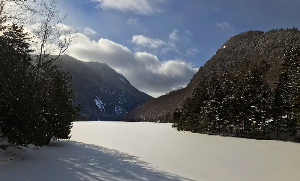 Lower Ausable Lake again, now glowing in early afternoon sun after a successful ascent of Sawteeth Mountain.