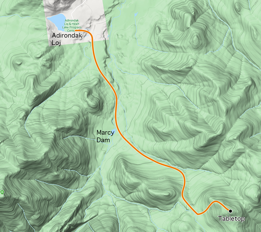 The standard route to Tabletop Mountain starts heading south from the Adirondak Loj, past Marcy Dam and along the Van Hoevenberg Trail towards Marcy. A well-marked spur brings you to the summit.