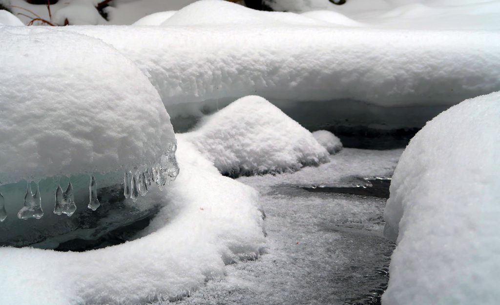 Snow and ice in various forms while crossing Skylight Brook.