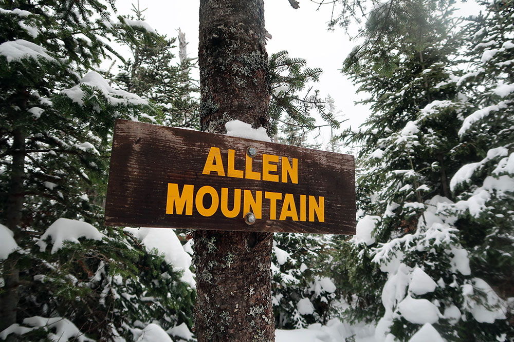 Allen Mountain sports the most remote of the 46er summit signs.