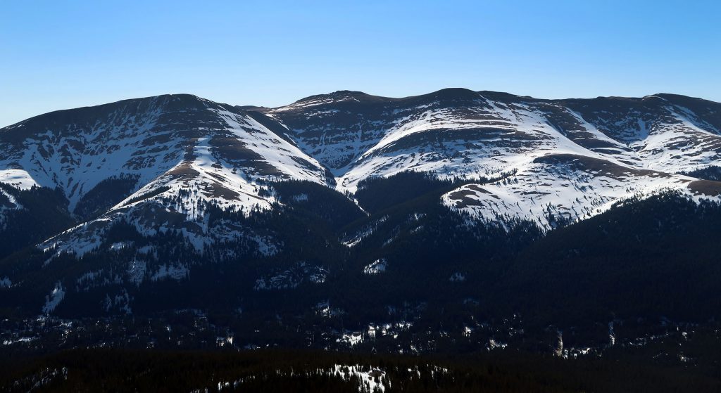 Across the valley from Quandary Peak, snow cover had grown thin and patchy on the southern exposure of nearby hills.