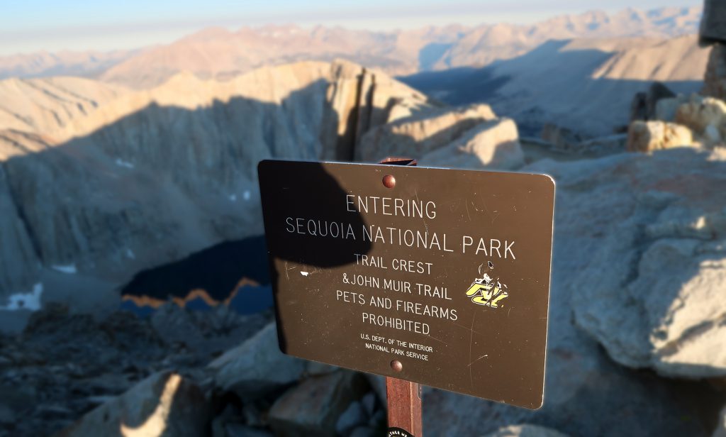 The Whitney trail merges with the John Muir trail at Trail Crest, where it skirts right along the eastern boundary of Sequoia National Park.