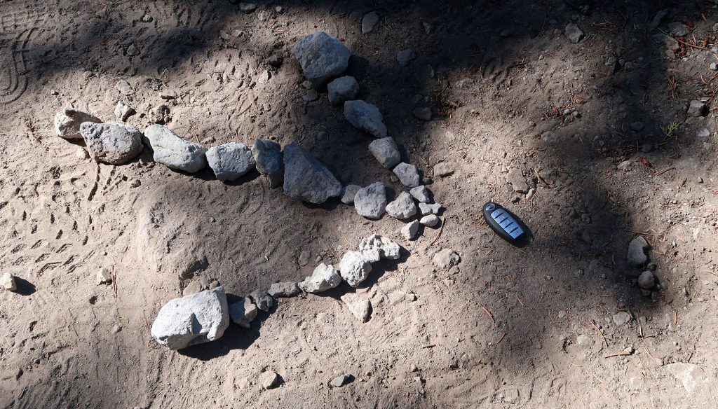 Someone dropped their car keys on trail, while other hikers built a giant arrow from rocks.