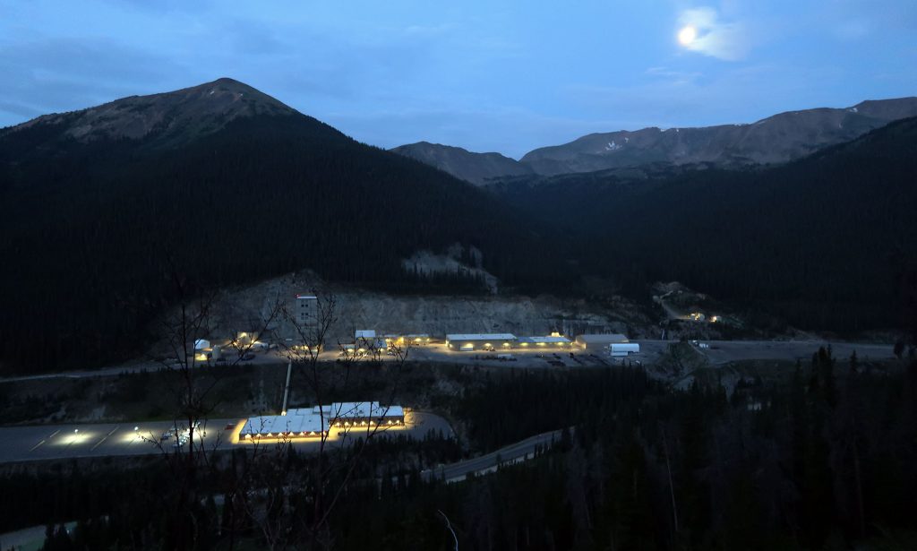 The Henderson Mine, aglow in the pre-dawn hours, seen en route to Vasquez and Stanley peaks.