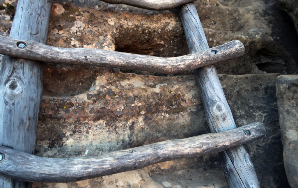 Behind a "modern" ladder used to access the cliff dwelling, you can see hand- and foot-holds carved into the cliff face over 700 years ago.